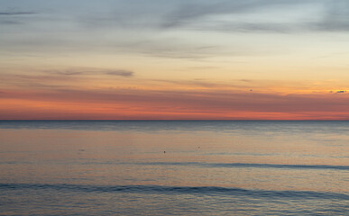 Fototapeta na wymiar beautiful sunset over the ocean with colorful sky
