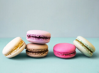 colorful macaroons on blue background