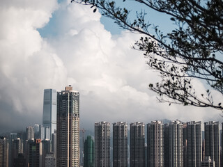 Building sky line background with white cloud in Hong Kong