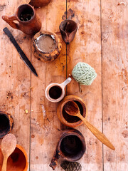 table with pottery with food as a background