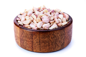 Garlic Fresh garlic in a wooden bowl Put on a white background