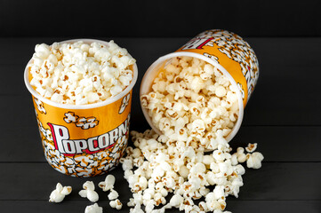 Close up, a selective focus shot of popcorn bucket on a gray background