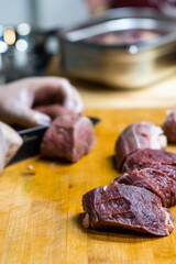 raw meat on a cutting board