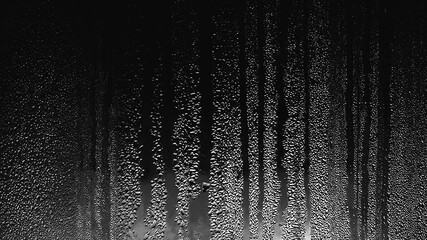 rainy abstract transparent water splash overlay explosion crown shape on black.