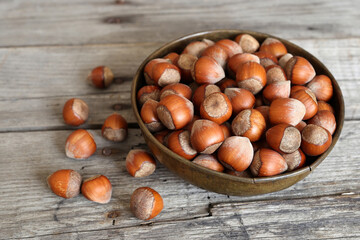 hazelnuts in a wooden bowl