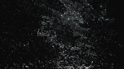 rainy abstract transparent water splash overlay explosion crown shape on black.