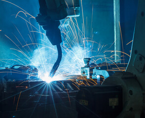 Welding robots movement in a car factory