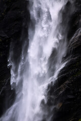 Huge waterfall in Norway falling down the rock
