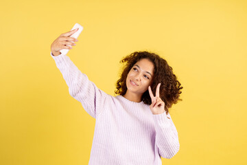 Adult african american woman on yellow copy space background