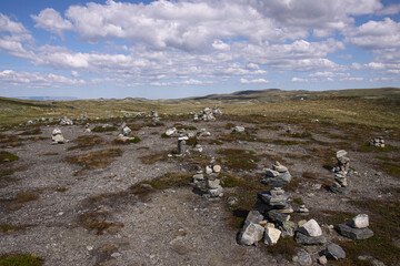 Plateau landscape with beautiful clouds and zen pyramids