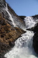 The mighty Kjosfossen waterfall. View from the train going to Myrdal
