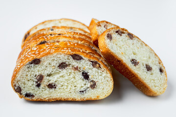 Vegan sliced fine whole wheat bread on white background for bakery, food and eating concept