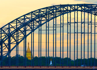 bridge over the river at sunset