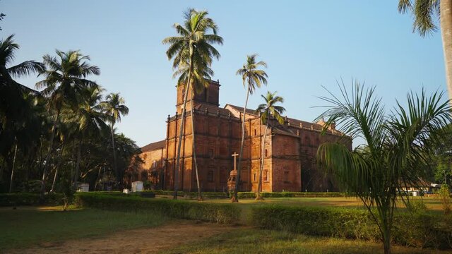 Exterior of historic Basilica of Bom Jesus in Old Goa, India, a UNESCO World Heritage at sunrise.