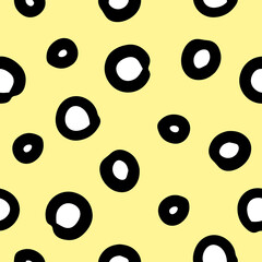 Fototapeta premium geometric vector seamless pattern with hand-drawn doodle circles on an yellow background. can be used as Wallpaper, background, design of packaging paper, textiles, notebooks, clothing.