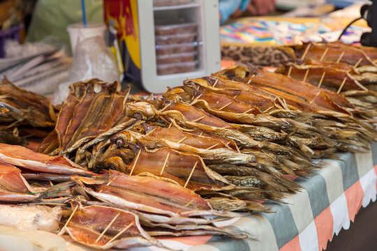 Fish trade in the market. Smoked omul on the counter.