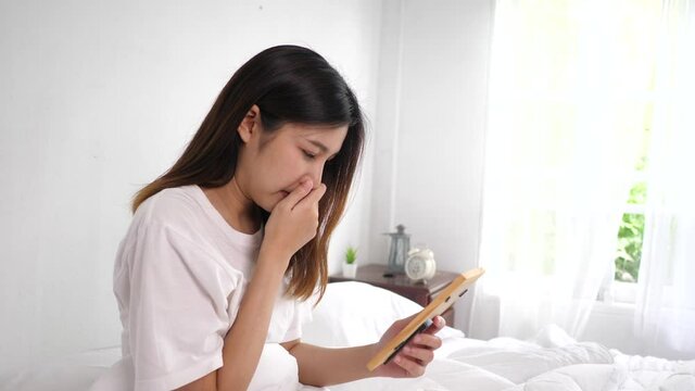 Sadness woman looking photo in frame with feeling of miss