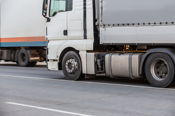 Trucks moving on the road