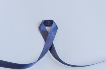 Dark Blue Ribbon. Health care and awareness concept.