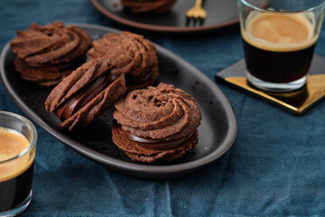 Christmas sandwich cookies filled with chocolate ganache and coffee.