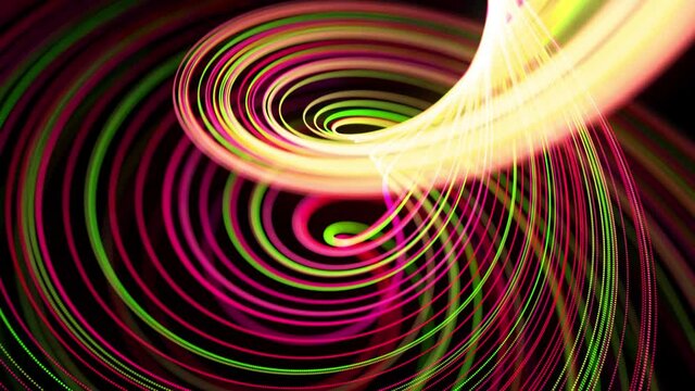 Light flow bg in 4k. Abstract looped background with light trails, stream of green red yellow neon lines in space move to form spiral shapes. Modern trendy motion design background light effect