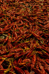Red chilli kept in the sun get dried
