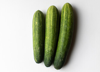 Fresh cucumbers, isolated, on a white background, Closeup view
