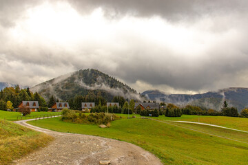 Wooden houses napolane in the mountains