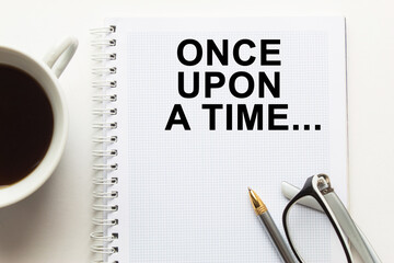 text ONCE UPON A TIME in a magnifying glass, office concept, business concept, Finance