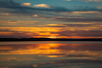 Fototapeta na wymiar Yngen lake, sunset, cloud reflection
