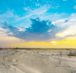 winter snowbound plain at the sunset, winter evening outdor scene