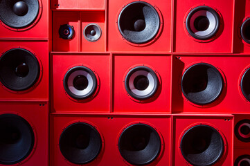 Photo of close up wall with red audio speakers background