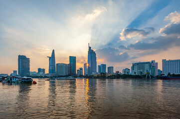 Sunset over Ho Chi Minh city , Vietnam. View from the banks of the Saigon River. 