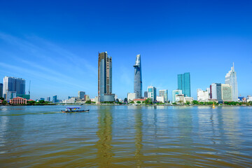 Fototapeta na wymiar View of Hochiminh city from the banks of the Saigon River. Ho Chi Minh City, Vietnam.