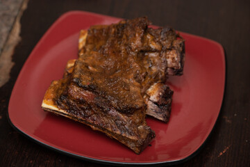 A piece of an oven grilled piece of ribs