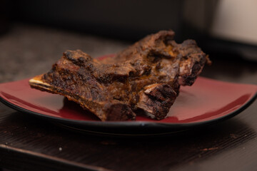 A piece of an oven grilled piece of ribs