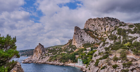 Fototapeta na wymiar Coastal seascape landscape. Mount Cat, Koshka, the black sea coast near Yalta, town Simeiz, Crimea
