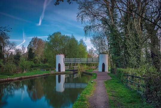 A footbridge spanning the Birmingham and Fazeley Canal near Drayton in Staffordshire, UK