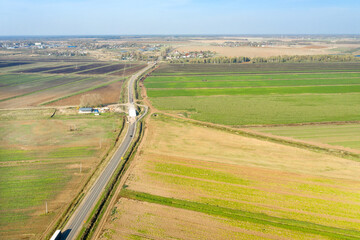 Top view of agricultural fields in autumn day