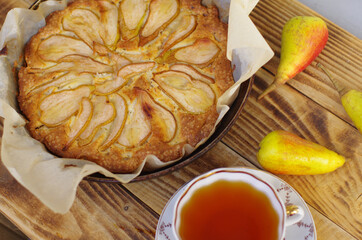 sweet pear pie with a Cup of black tea