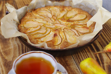 sweet pear pie with a Cup of black tea