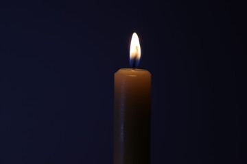 Candle black background of mourning funeral moment of silence	