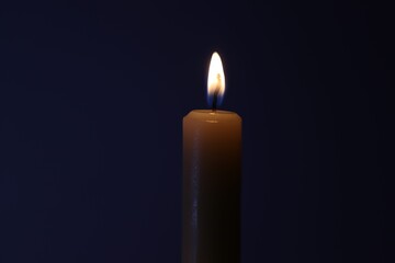 Candle black background of mourning funeral moment of silence	