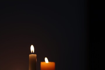 Candle black background of mourning funeral moment of silence	