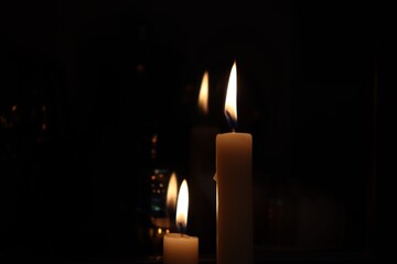 Candle black background of mourning funeral moment of silence	