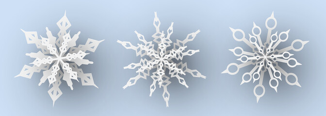 Fototapeta na wymiar Set of paper cut snowflakes. Vector illustration.