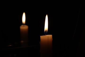 Candle black background of mourning funeral moment of silence	