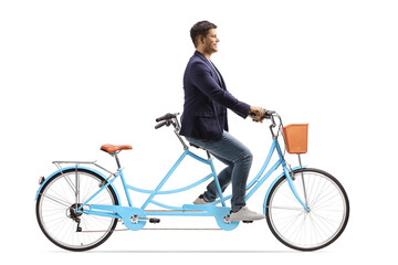 Man riding a tandem bicycle alone