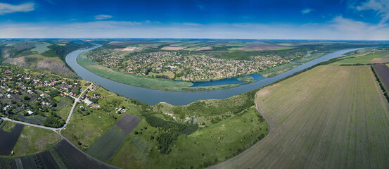 Aerial shot of rural landscape with river and little village. Tsipova. Moldova republic of. © Igor Syrbu