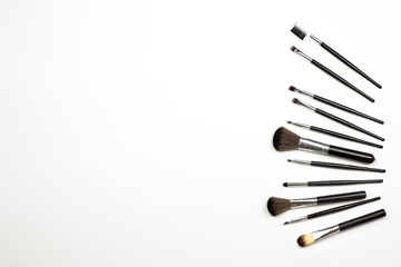 Make-up products set and tools. Set of different size makeup brushes on white background